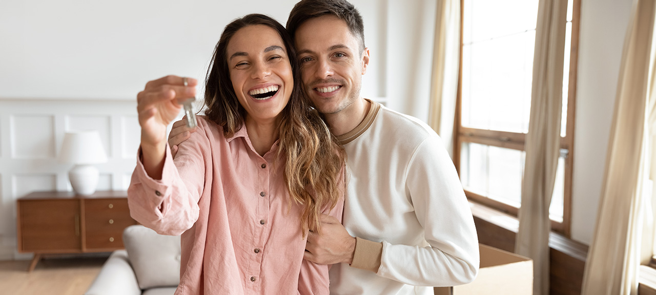 A couple buying their first home